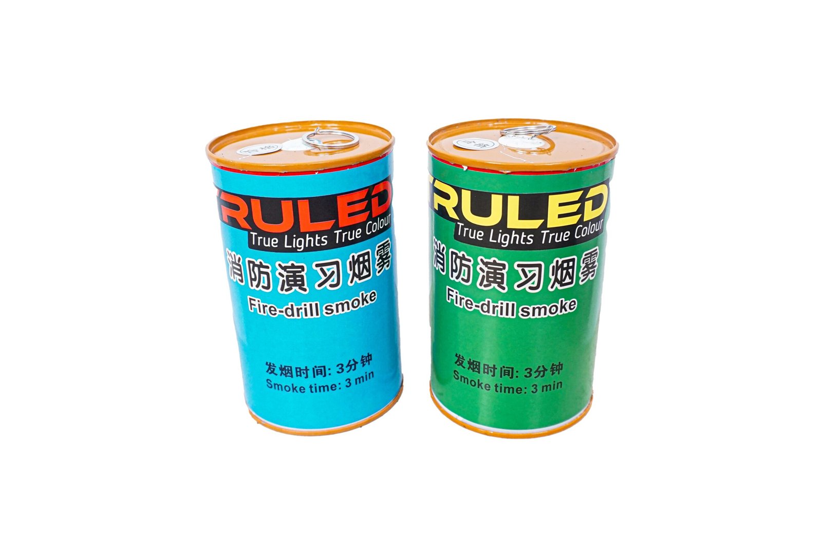 Two colorful fire-drill smoke canisters side by side, blue and green, with orange tops and text including 'Smoke time: 3 min'.