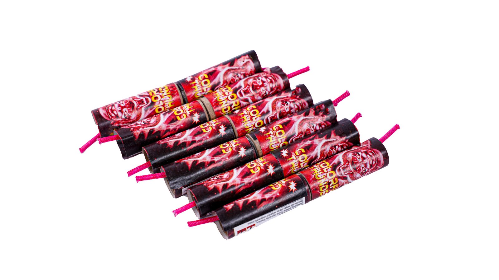 Bundle of red and black firework rockets with pink fuses, arranged diagonally for display.