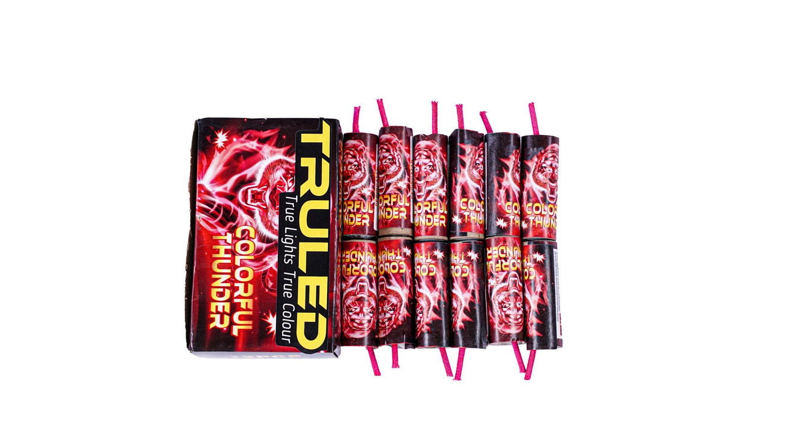 Row of red Color Thunder fireworks sticks with pink fuses beside a black-and-red packaging box.