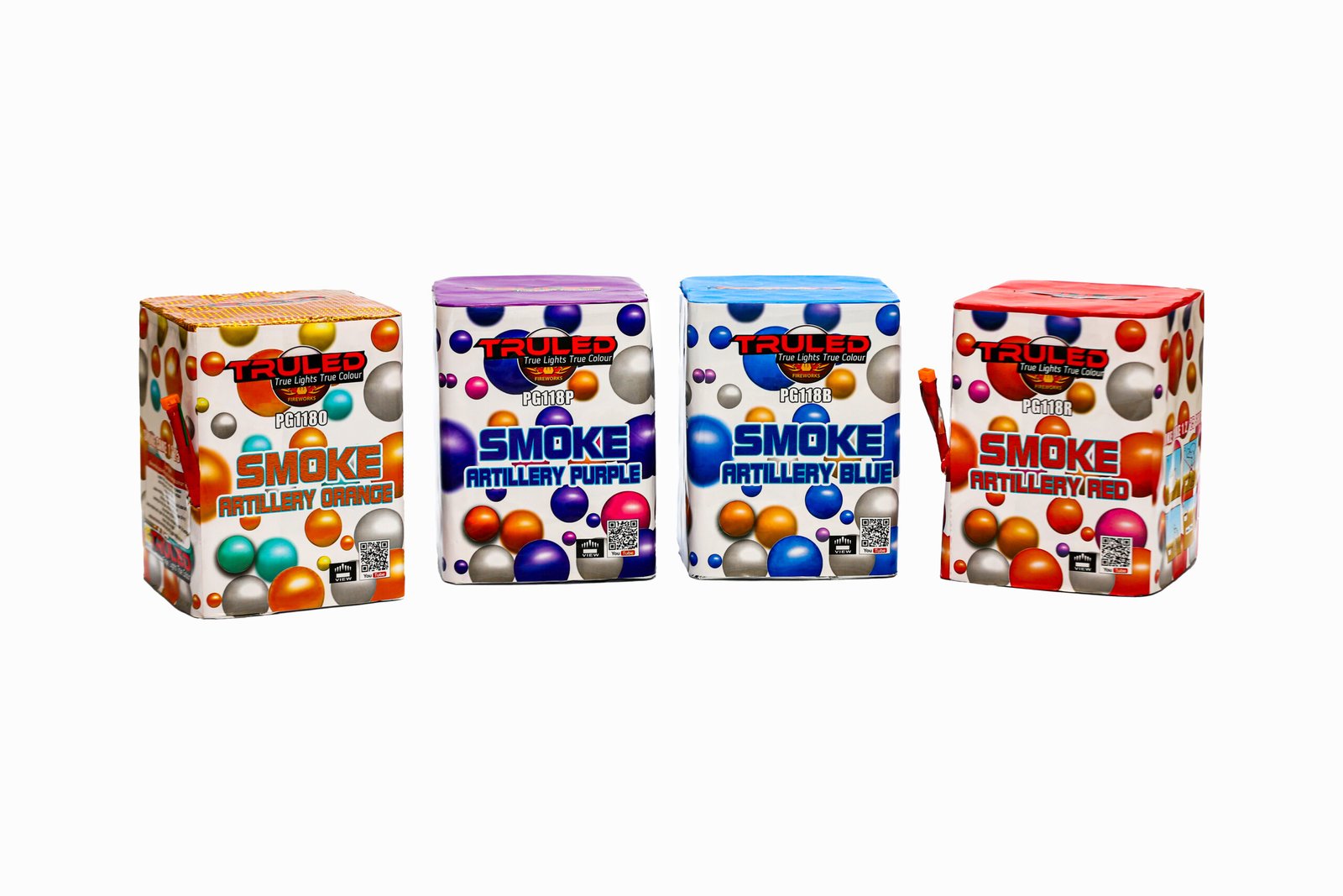 Four TRULED Smoke Artillery boxes in orange, purple, blue, and red, lined up on a white surface.