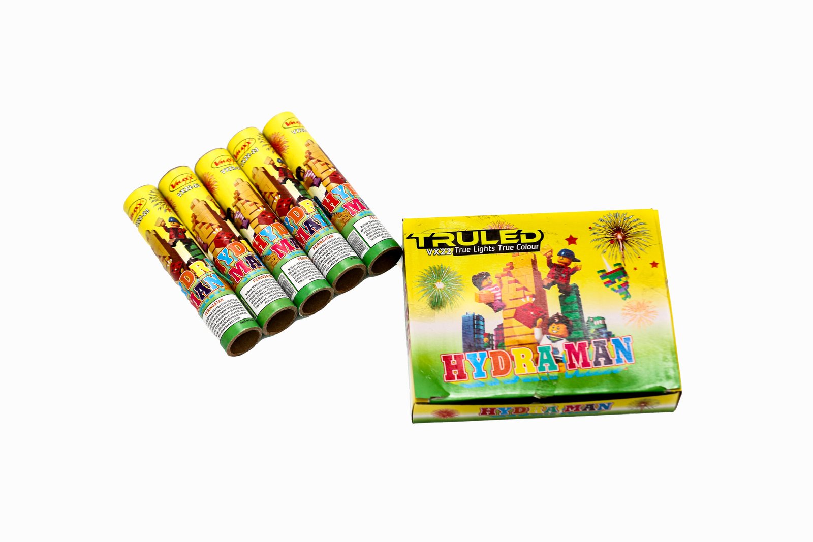 Assorted yellow-wrapped novelty fireworks (tube rockets) with a bright yellow box showing fireworks graphics.