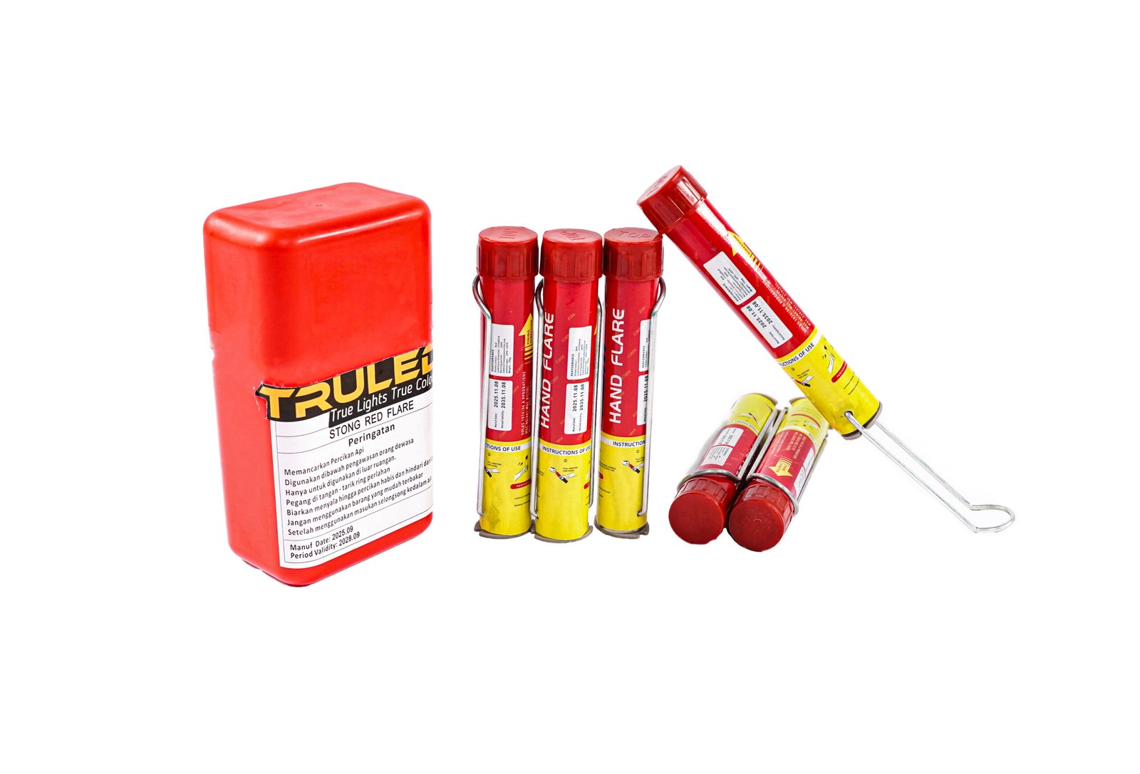 Assorted fireworks: a large red rectangular firework with labels and several red-and-yellow tubes on a white background
