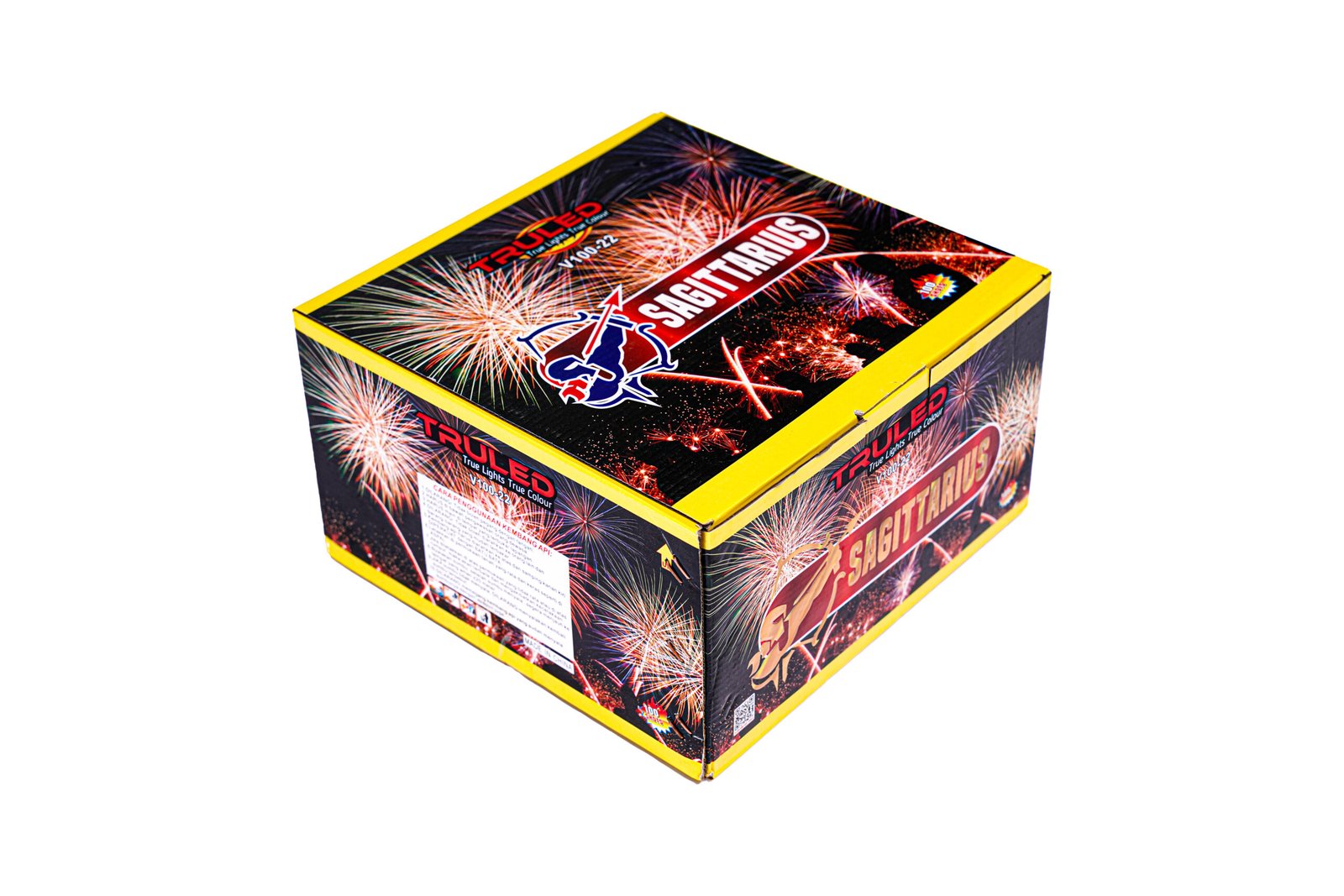 Box of fireworks with bright firework graphics and yellow edges, tilted in the frame.