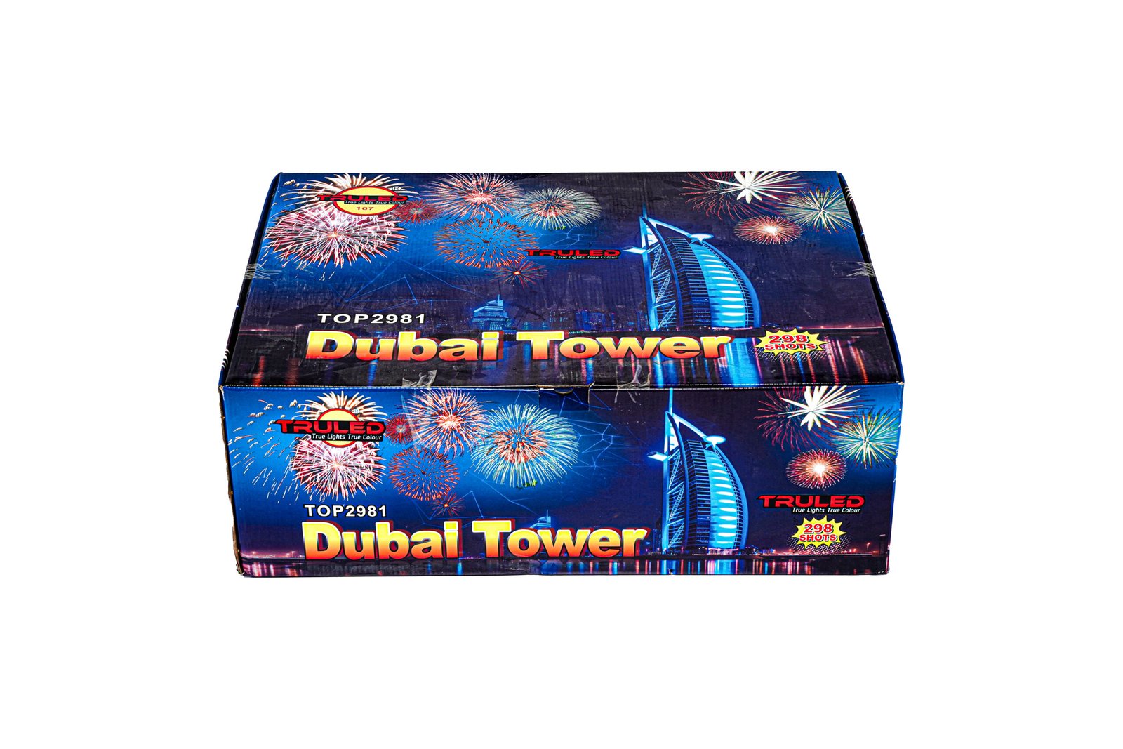 Blue fireworks box labeled Dubai Tower with skyline graphics and colorful bursts of fireworks; mentions 208 shots on the packaging.