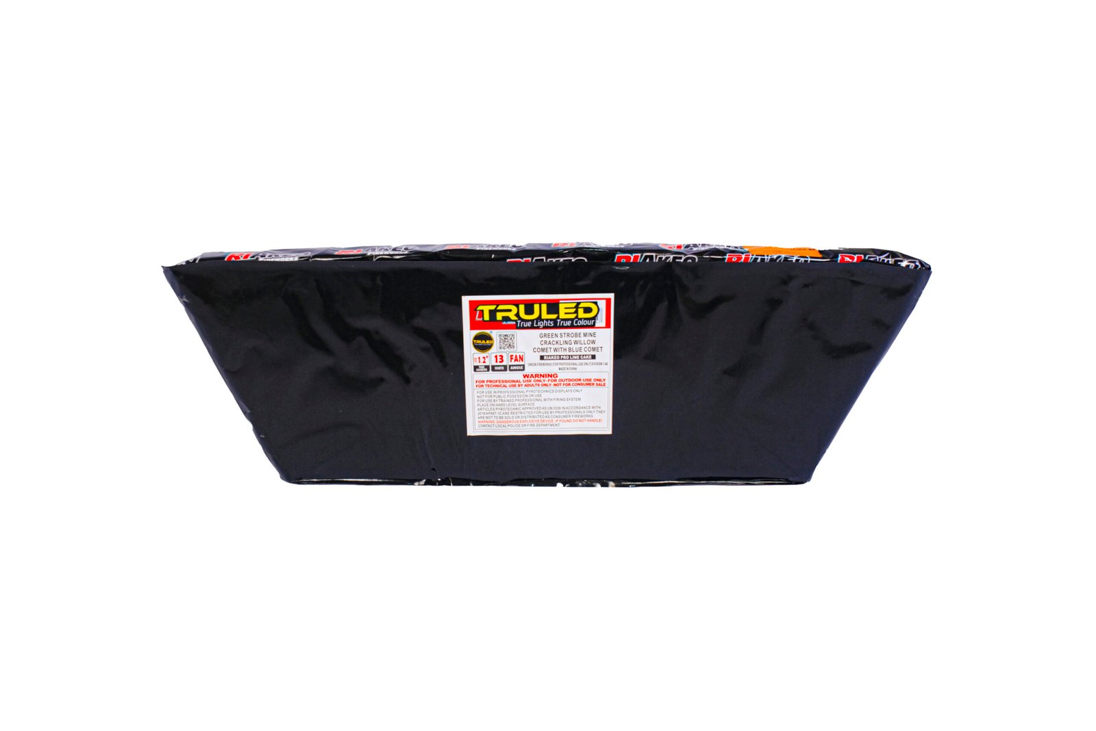 Black rectangular package with a red-and-white TRULED label, a fireworks cake wrapper with small print warnings visible on the front.