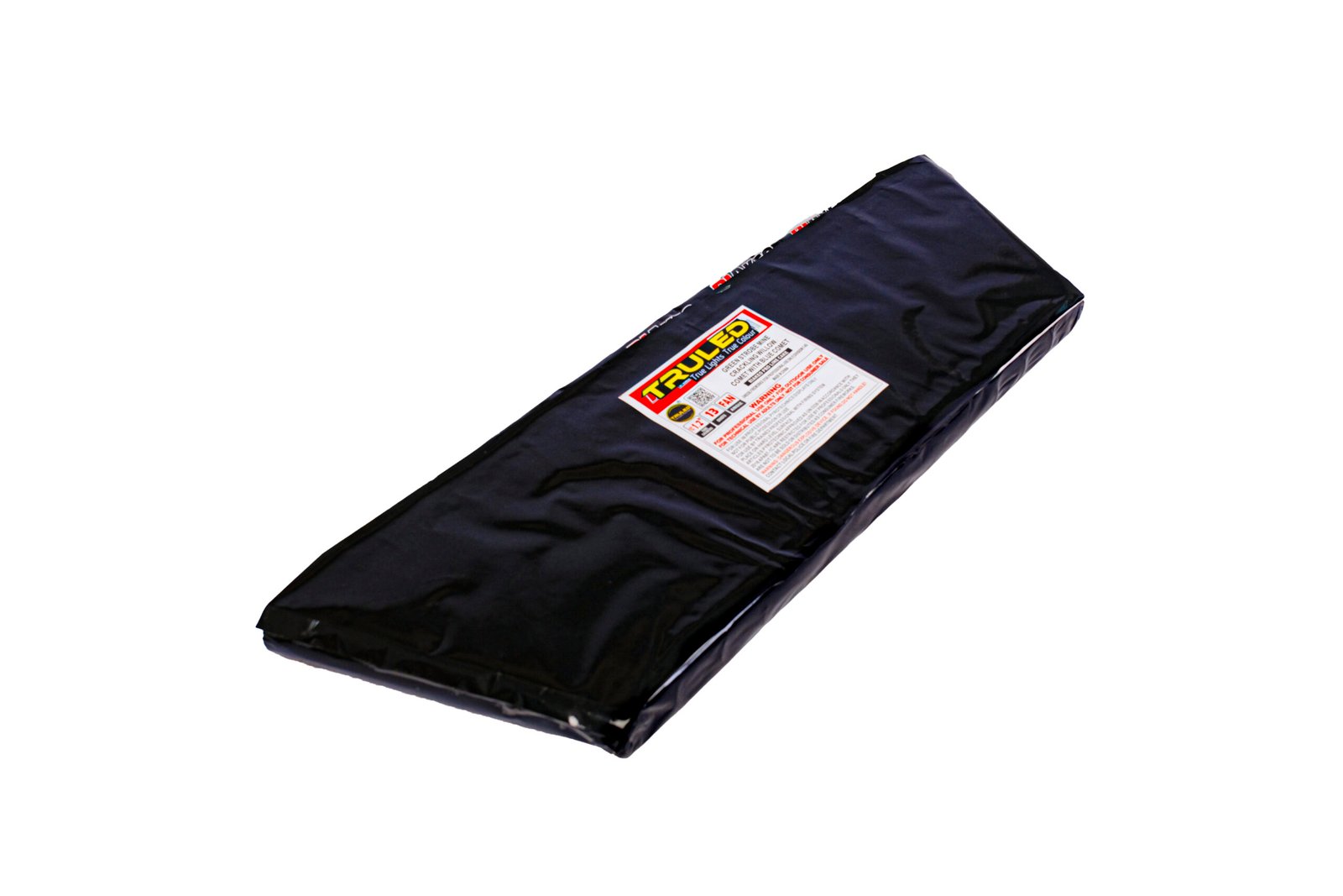 Long black rectangular package wrapped in plastic with a red-and-white label on top (brand name TRUE).